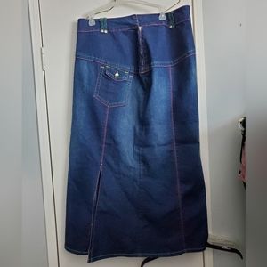 Long dark denim Jean skirt. Size 16 with side slit.